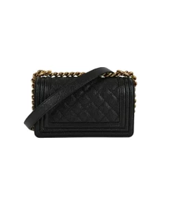 Back view of black Chanel Small Boy Bag crossbody with structured shape and gold hardware