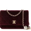 Front view of Mahroon CHANEL Velvet Quilted Pearl Crush Wallet On Chain showing CC turn-lock closure and quilted design