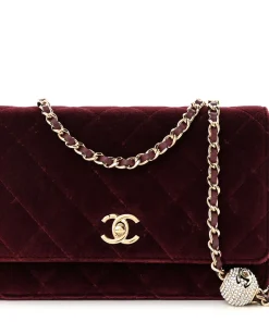 Front view of Mahroon CHANEL Velvet Quilted Pearl Crush Wallet On Chain showing CC turn-lock closure and quilted design