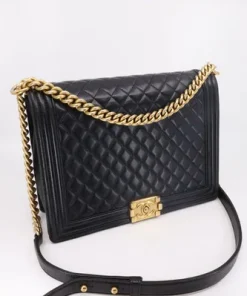 Side view of Chanel Large Boy Bag in Calfskin, showcasing quilted design