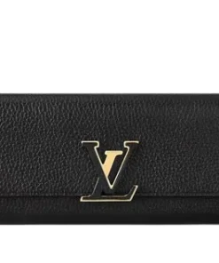 Front view of Louis Vuitton Capucines Wallet in black Taurillon leather with golden LV logo