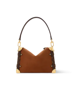 Tan suede Louis Vuitton Side Trunk MM worn as crossbody with gold chain