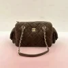 Chanel 25 collection dark grey suede bowling bag with quilted leather and gold accents
