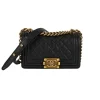 Front view of black Chanel Small Boy Bag in caviar leather with aged gold hardware