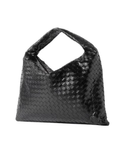 Classy side view of Bottega Veneta Hop Intrecciato black leather tote showing single compartment and zipped pocket