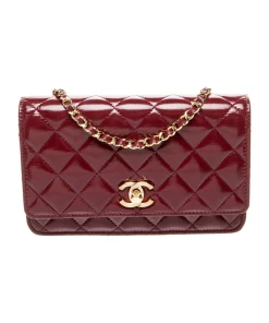 Chanel quilted patent mahroon leather wallet featuring signature CC logo