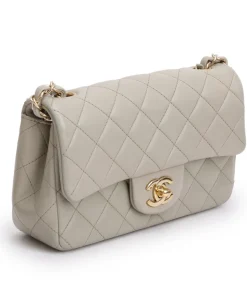 Side view of a Chanel Classic Flap Bag showing smooth lambskin leather and structured shape