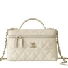 white Chanel luxury vanity style shoulder bag with zipper closure