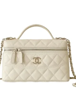 white Chanel luxury vanity style shoulder bag with zipper closure