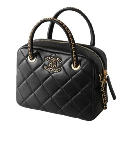 Side angle of Chanel 25C Mini Bowling Bag in black quilted lambskin leather with chain strap