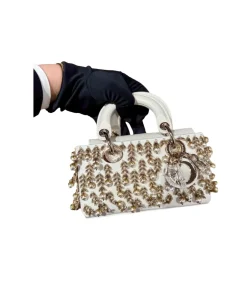 Milk white Dior mini crossbody bag with pearl detailing and strap