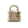 Christian Dior Lady Dior mini handbag in latte calfskin with multicolor floral bead embroidery and elegant top handle design