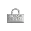 Christian Dior Lady D-Joy designer handbag with structured silhouette and signature charm