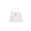 White Louis Vuitton Capucines BB handbag with colorful rainbow strap