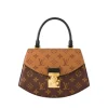 Brown Louis Vuitton Tilsitt handbag with monogram canvas and gold S-lock closure