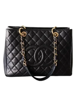 Black Chanel Medallion Tote bag with quilted caviar leather and gold chain handles