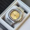 Elegant luxury watch with yellow gold dial and multi-colored gemstone bezel showcasing premium design aesthetics