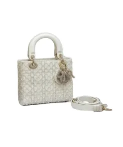 Elegant white Dior handbag with crystal embellishments