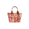 Hermès Steeple 25 canvas tote bag with vibrant orange and red equestrian print and leather top handles