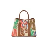 Colorful Hermès Garden Party 36 tote bag in capucine, ecru, and gold canvas with leather trim and structured base