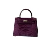 Premium luxury handbag with top handle and structured shape