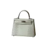 Sellier style structured handbag with luxury finish