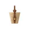 Brown raffia Louis Vuitton All In BB handbag with leather trim styled for summer beach outfit