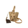 Beige woven straw bucket bag styled for summer outfit with light natural texture and elegant design