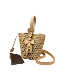 Beige woven straw bucket bag styled for summer outfit with light natural texture and elegant design