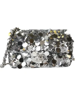 Silver and black sequin Chanel mini flap bag with silver hardware in elegant luxury style