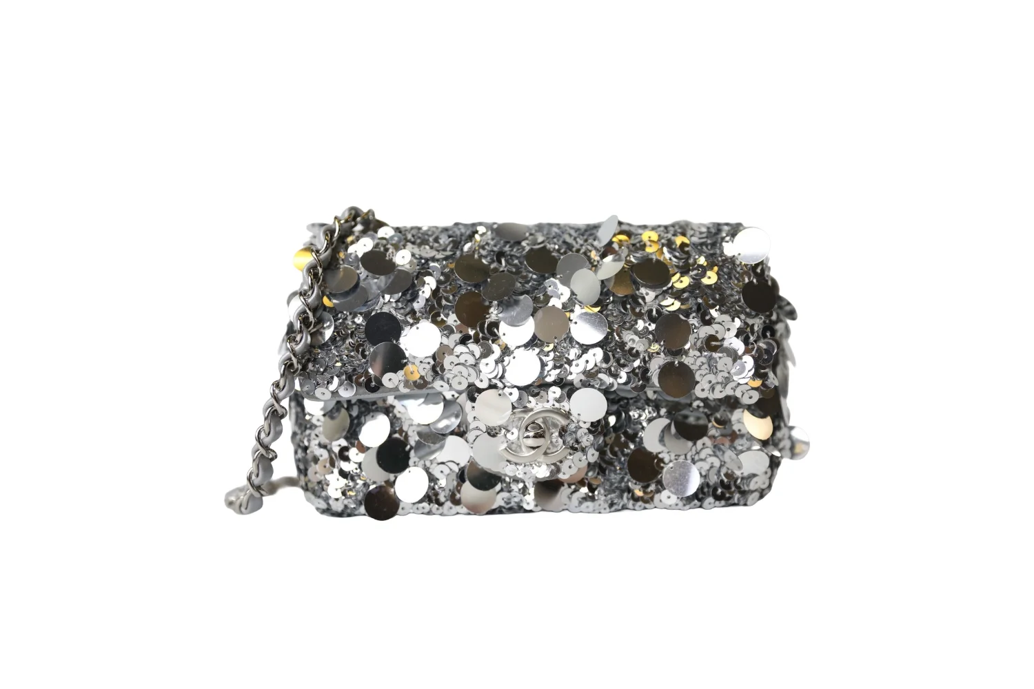 Silver and black sequin Chanel mini flap bag with silver hardware in elegant luxury style