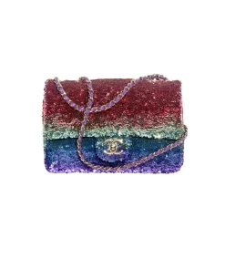Chanel small flap bag in multicolor sequins with gold CC logo, mini shoulder bag with chain strap and purple lambskin interior