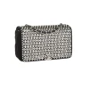 Black Chanel velvet flap bag with silver hardware and embellishments