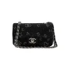 Stylish black rhinestone quilted crossbody bag with silver chain strap and flap closure