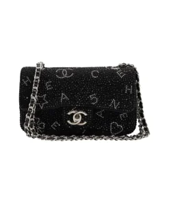 Stylish black rhinestone quilted crossbody bag with silver chain strap and flap closure