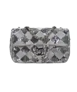Elegant silver sequin mini flap crossbody bag with Chanel-style chain strap and CC turn lock