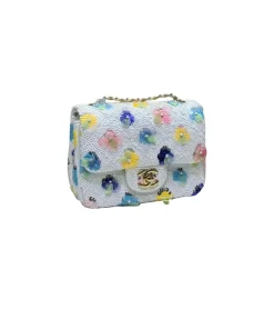 Stylish white crossbody bag featuring multicolor floral appliqué and gold hardware for summer fashion