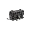 Luxury Chanel black and silver strass crystal flap bag worn as crossbody with elegant chain strap