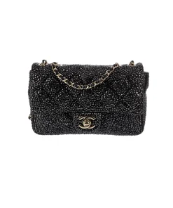 Black Chanel lambskin crystal diamante small flap bag with luxury quilted design and gold chain