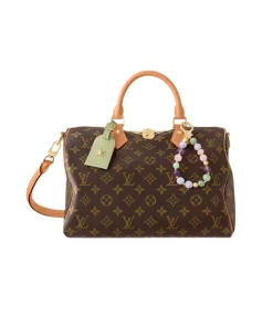 Green Louis Vuitton Speedy Soft 30 Lucky handbag with gold hardware