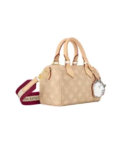 Louis Vuitton Speedy Bandoulière 20 with brown monogram and cat-shaped charm