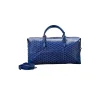 Blue Goyard Bowling 55 bag with yellow interior lining and leather corners