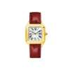 Elegant gold watch worn with formal outfit