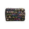 Elegant Chanel crossbody bag with black base and vibrant pink yellow sequin design for party wear