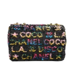 Elegant Chanel crossbody bag with black base and vibrant pink yellow sequin design for party wear