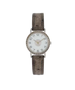 Hermès Sellier vintage ladies wristwatch with gold-plated case and chocolate brown leather strap in elegant display