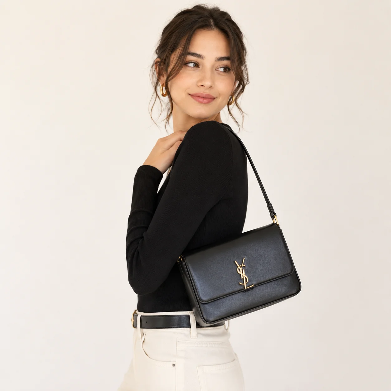 Elegant designer shoulder bag, quilted leather, chain strap, white background, luxury fashion product photo