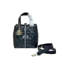 Stylish Black Dior Toujours tote handbag featuring black leather handles and detachable strap.